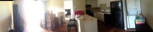 Panorama view of the living area and kitchen in the new apartment. I'm totally in love!